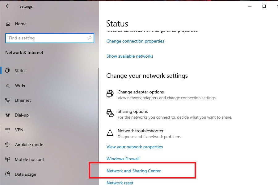 Klik Network & Sharing Center.